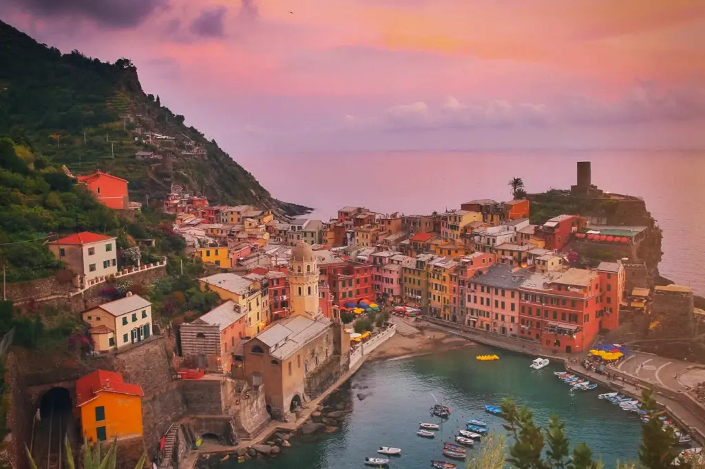 Colorful Cinque Terre coastal village overlooking the Mediterranean Sea at sunset